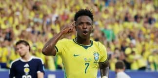 É #FAKE que telejornal noticiou que juiz de Brasil x Escócia foi suspenso da Copa do Mundo por anular gol de Vini Jr.; cena foi criada com IA É #FAKE que telejornal noticiou que juiz de Brasil x Escócia foi suspenso da Copa do Mundo por anular gol de Vini Jr.; cena foi criada com IA