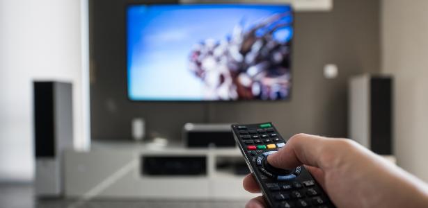 Manter pressionado o número 0 no controle da TV: para Imagem